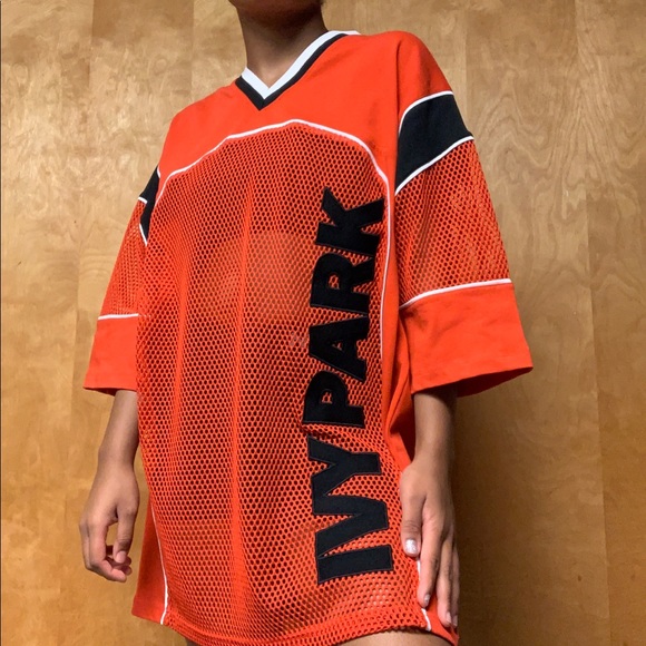 IVY PARK Tops - NWOT IVY PARK | ORANGE MESH JERSEY SM